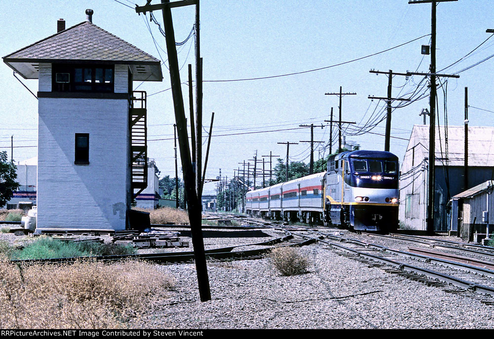 Amtrak eastbound San Joaquin train with CDTX #2003 at Stockton tower.